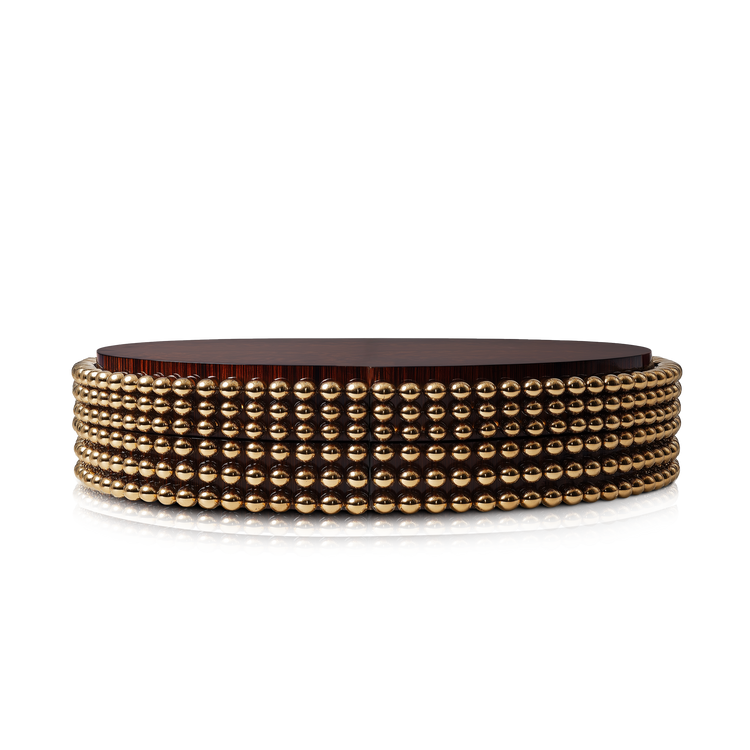 Lustra Coffee Table by Hekla Property with Macassar ebony top and gold-plated sphere base on white background.