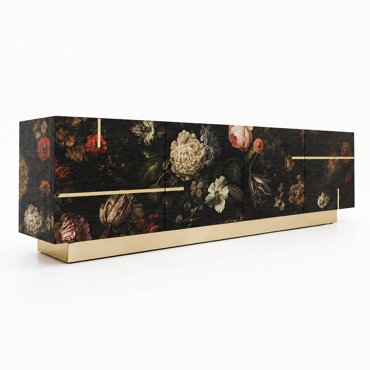 Aurelia sideboard shown from an angled view, featuring floral artwork on dark oak veneer, polished brass inlays and a brass plinth base.