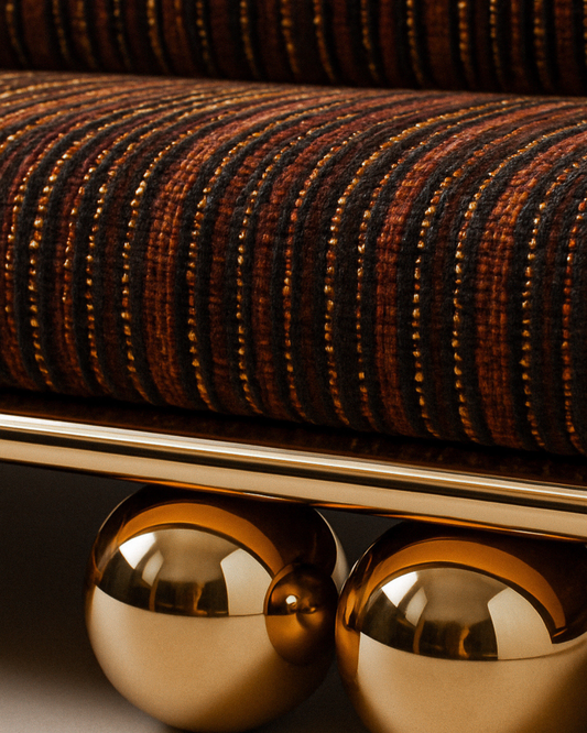 Close-up of Lustra Sofa upholstery texture in brown and gold tones.
