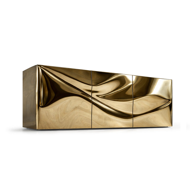 Radiance dining table with molten gold base and minimalist architectural silhouette.