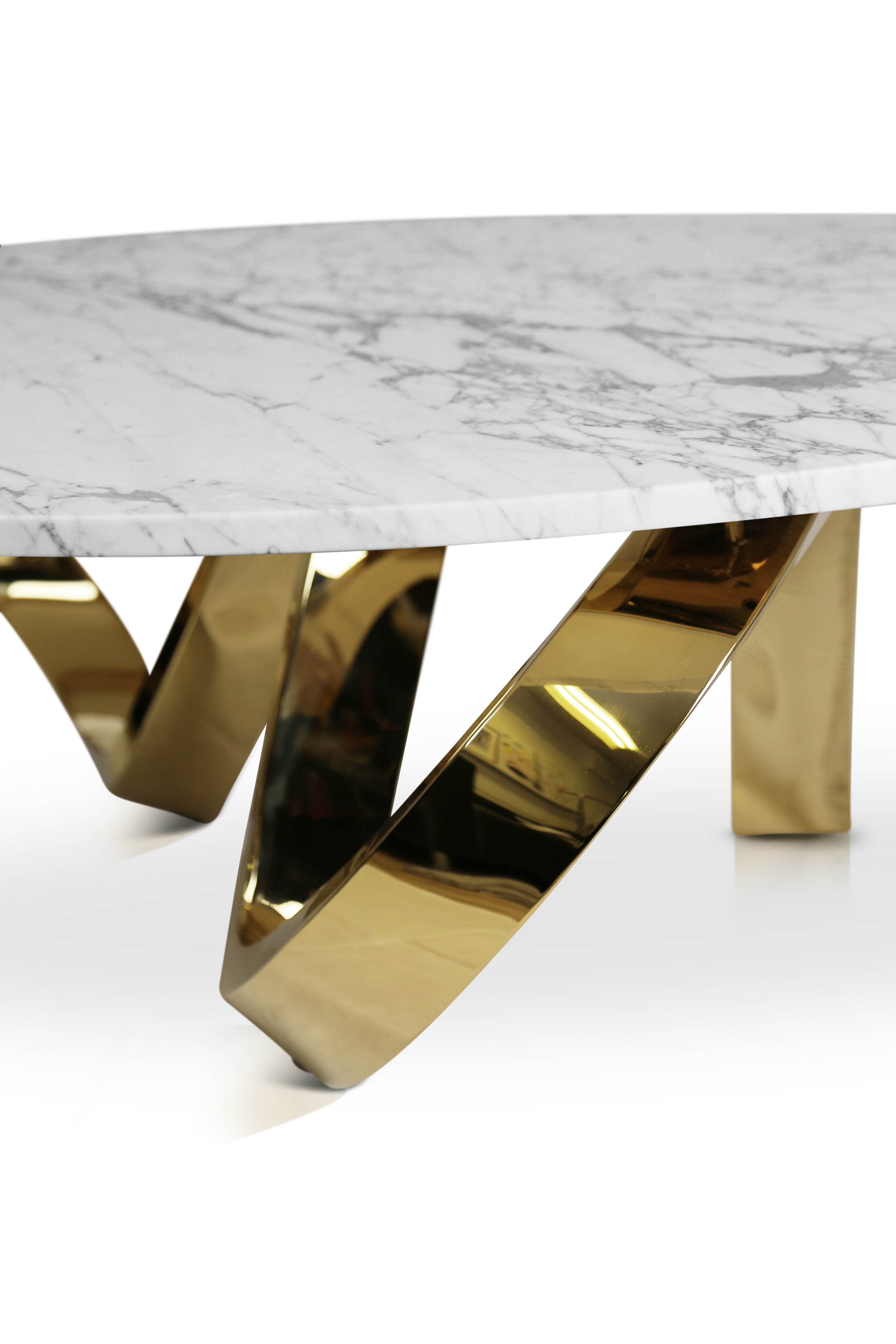 Luxury oval marble coffee table with artistic gold base – Erebus Collection.