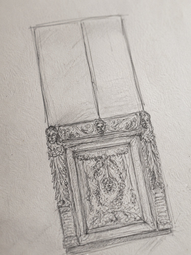 A pencil sketch of an ornate classical wall panel or decorative molding, drawn on textured off-white paper.