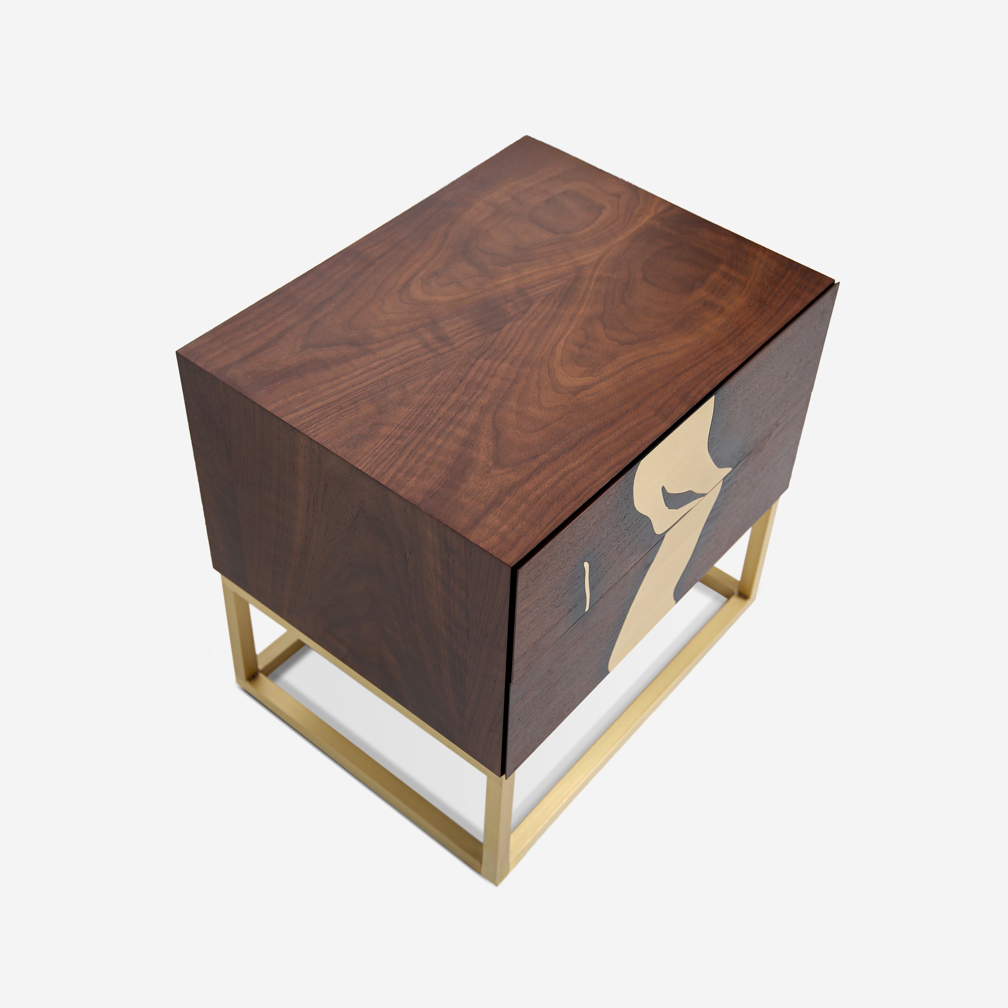 Modern nightstand with geometric brass base and sculptural brass detailing