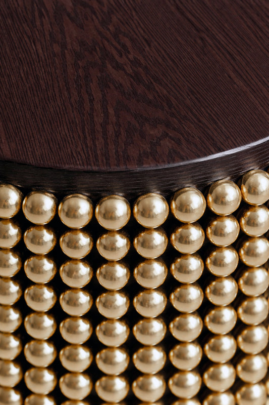 Sculptural side table featuring gold metal spheres and wenge wood tabletop