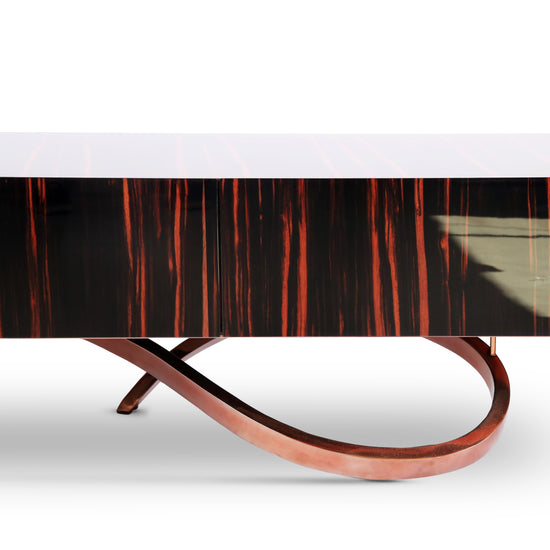 Handcrafted sideboard with copper-plated stainless steel base and rich ebony finish