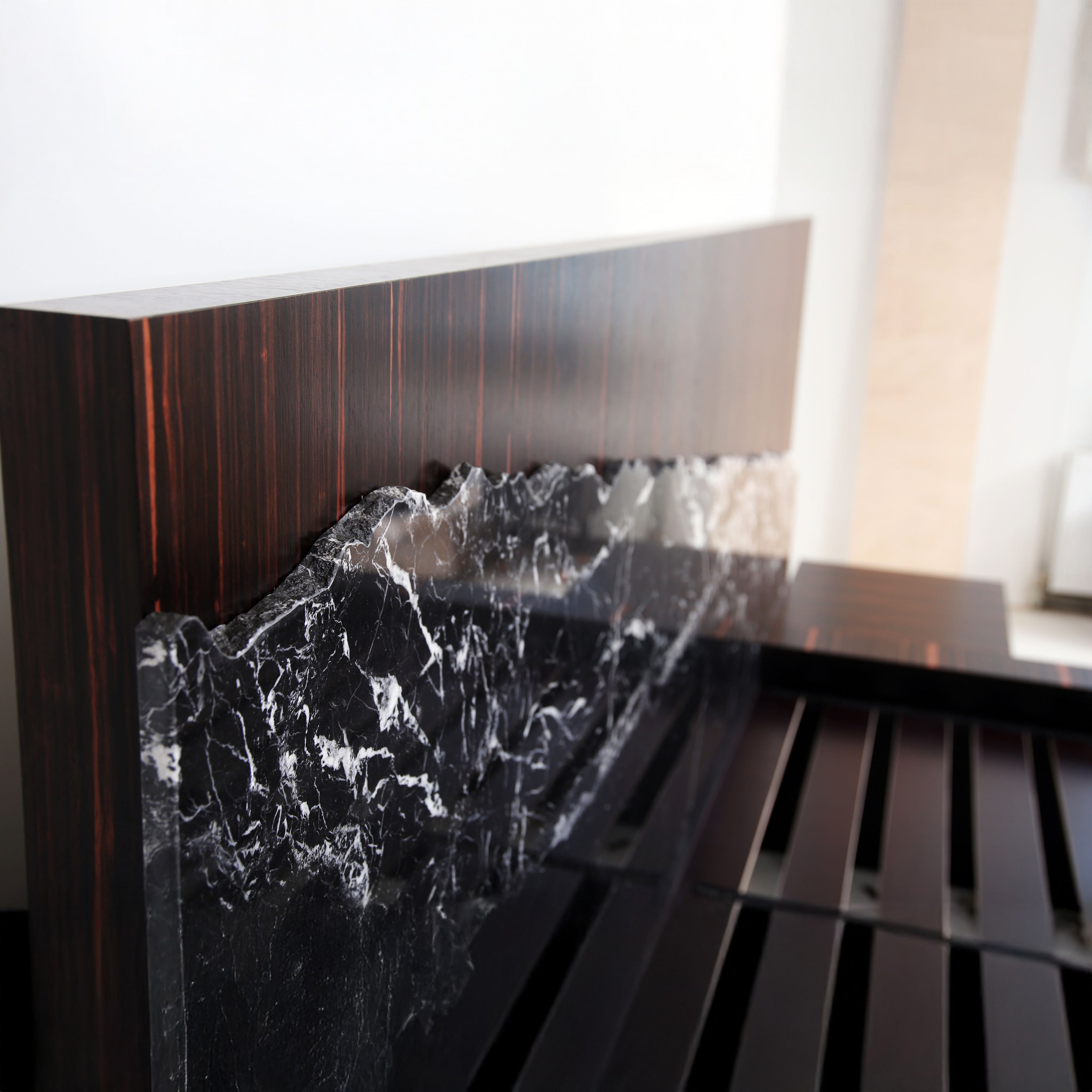 Modern luxury bedroom set featuring the Gullfoss Bed and matching marble bedside tables.