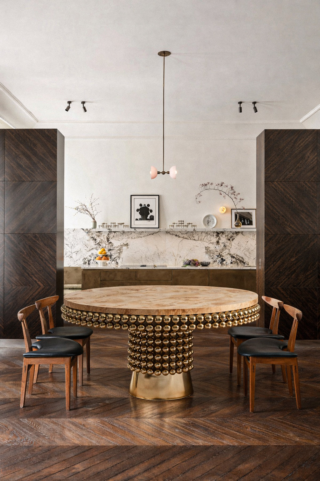 Contemporary collectible dining table with burl veneer surface and geometric base.