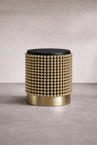 Architectural side table with gold sphere structure and matte black ash top, designed by Railis Kotlevs