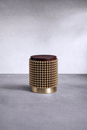 Contemporary designer side table in wenge veneer and gold metal spheres. Designed by Railis Kotlevs