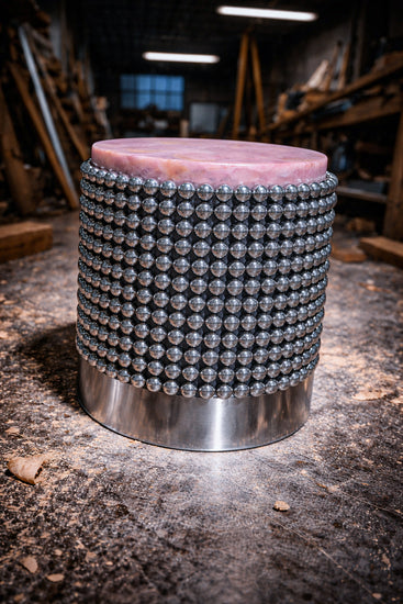 Contemporary accent table in pink onyx with mirrored chrome sphere column base