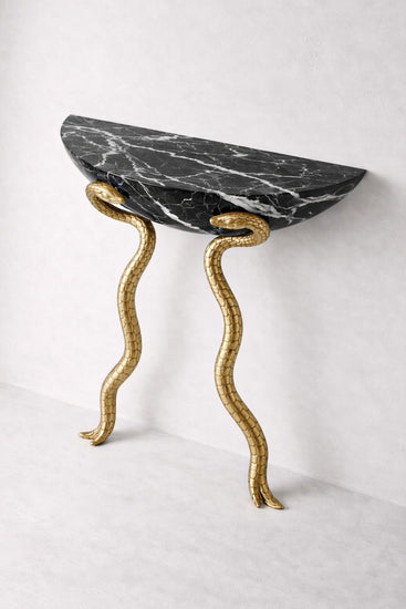 Contemporary console table with liquid metal brass serpents and black marble.