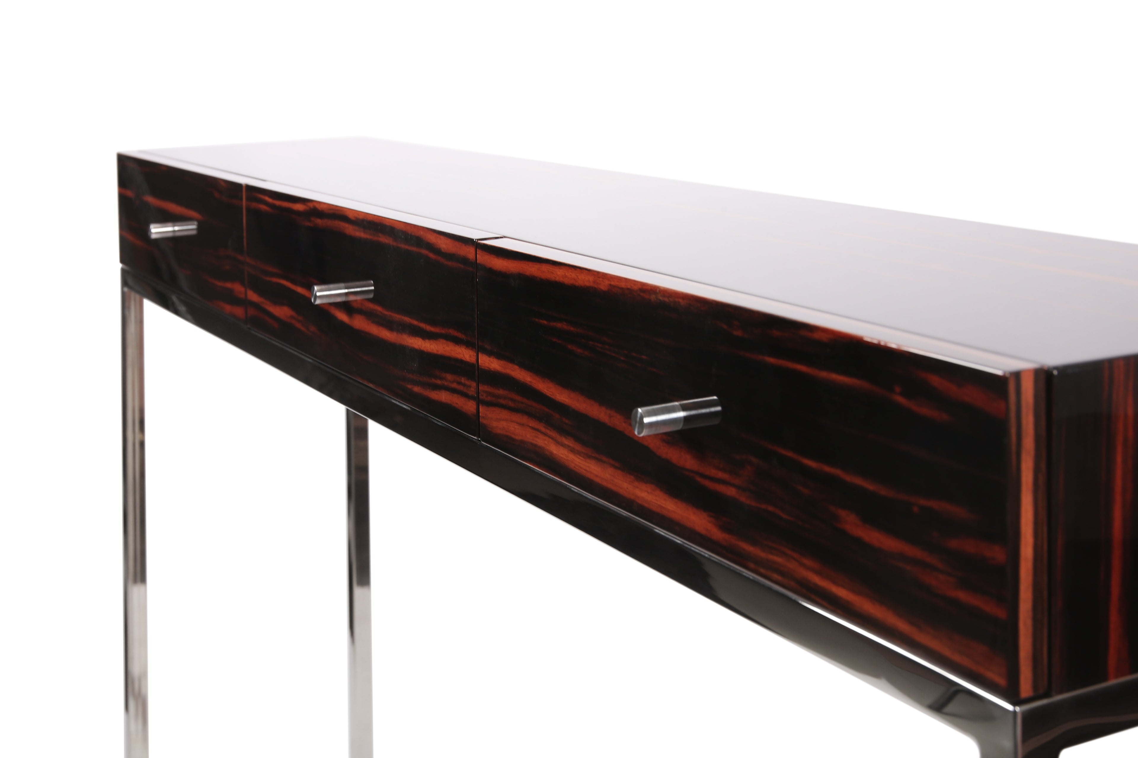 Minimalist console table with reflective steel legs and rich wood pattern.