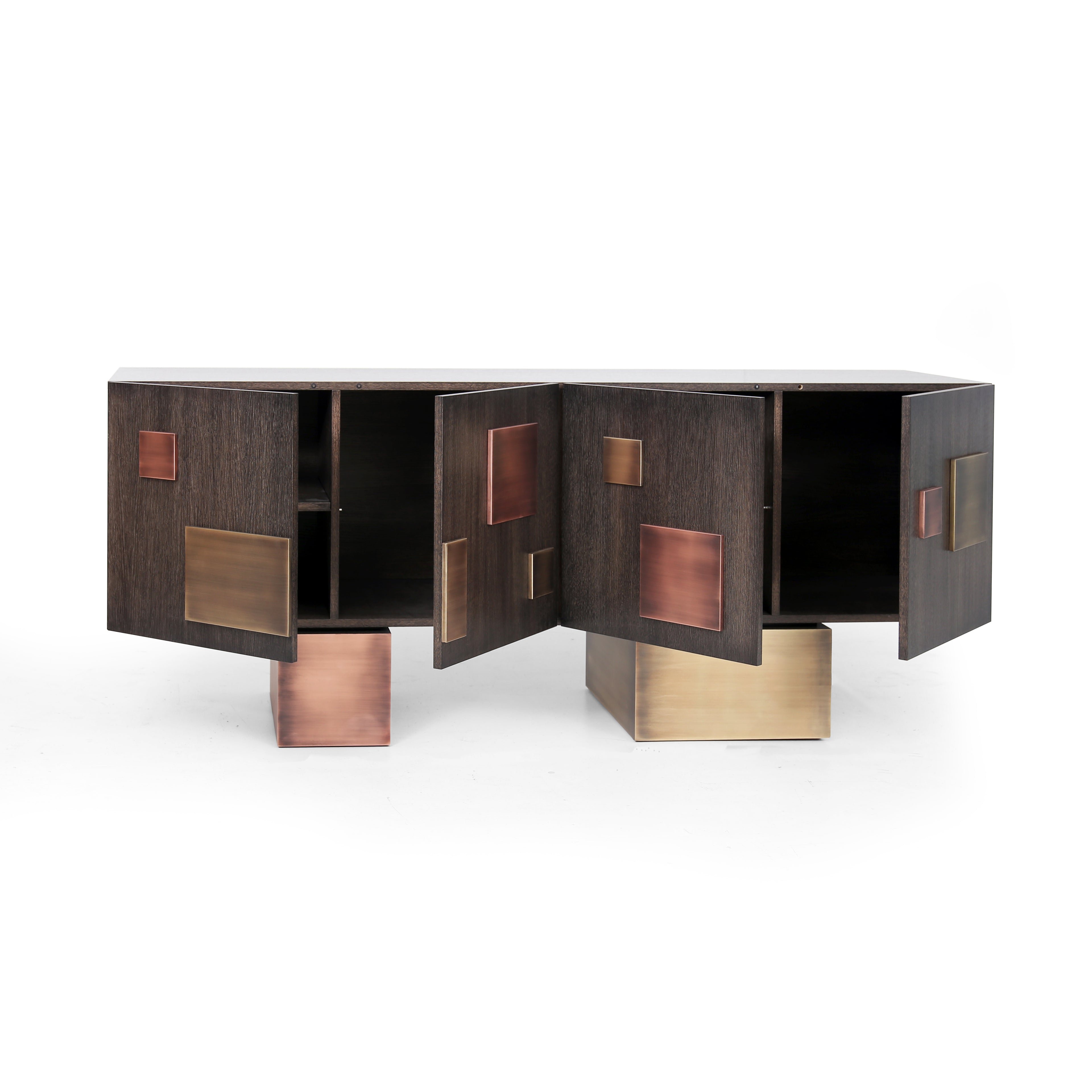 Modern designer sideboard with patinated brass and copper accents on sculptural wooden base.