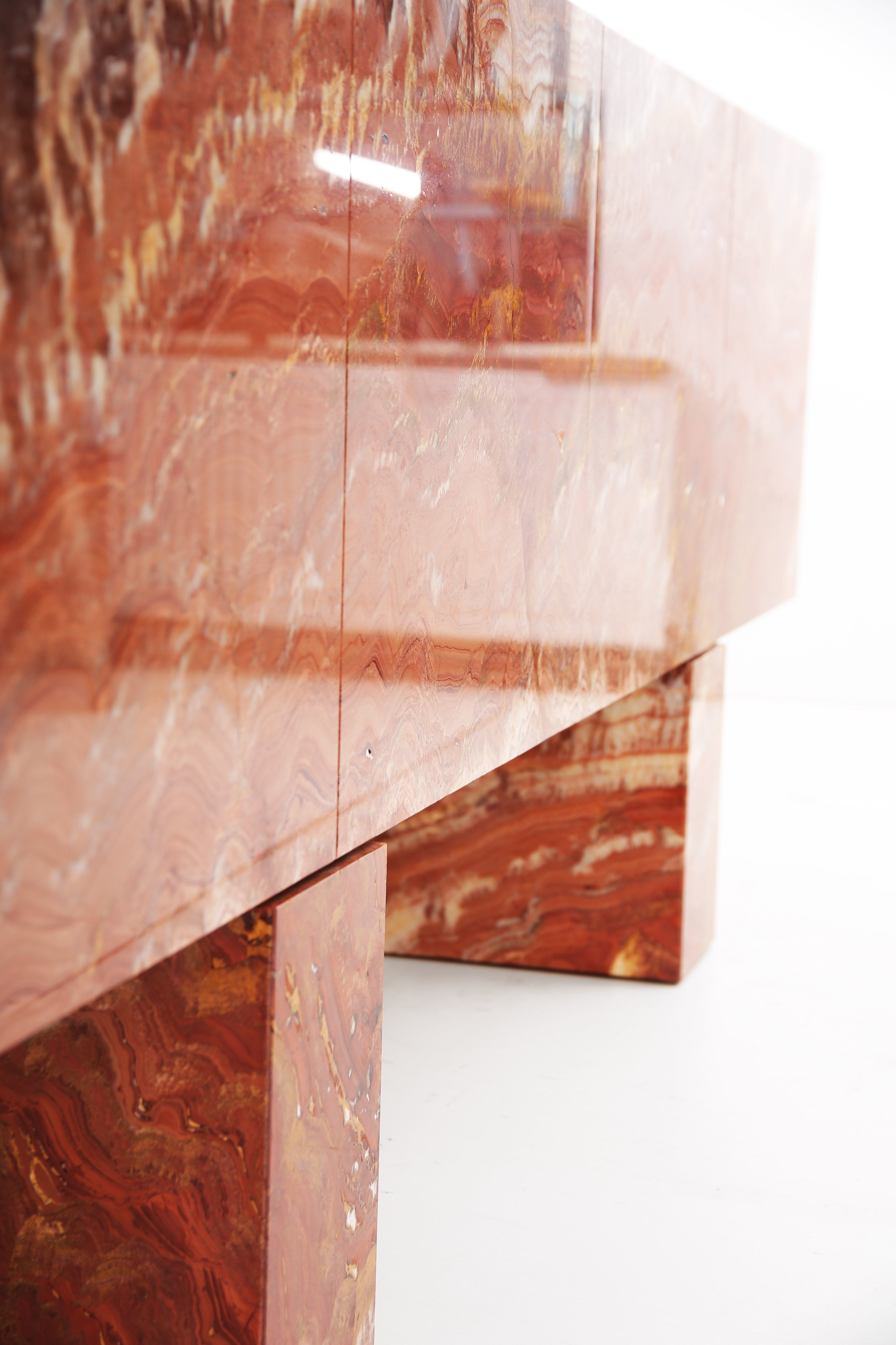 Custom red onyx cabinet with ash wood interior