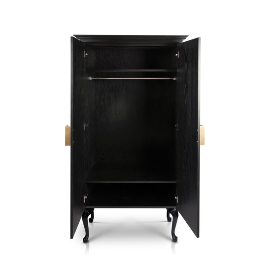 Elegant wardrobe blending traditional sculpture and modern craftsmanship.