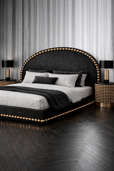 High-end accent table with textured gold spheres and black ash finish, designed by Railis Kotlevs