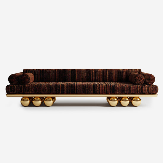 Lustra Sofa front view with gold-plated spherical base and bronze fabric.