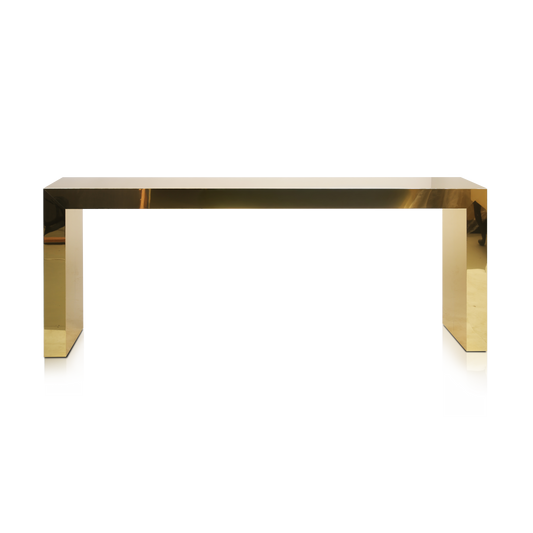 Polished brass console table with minimalist geometric design by Hekla Property.