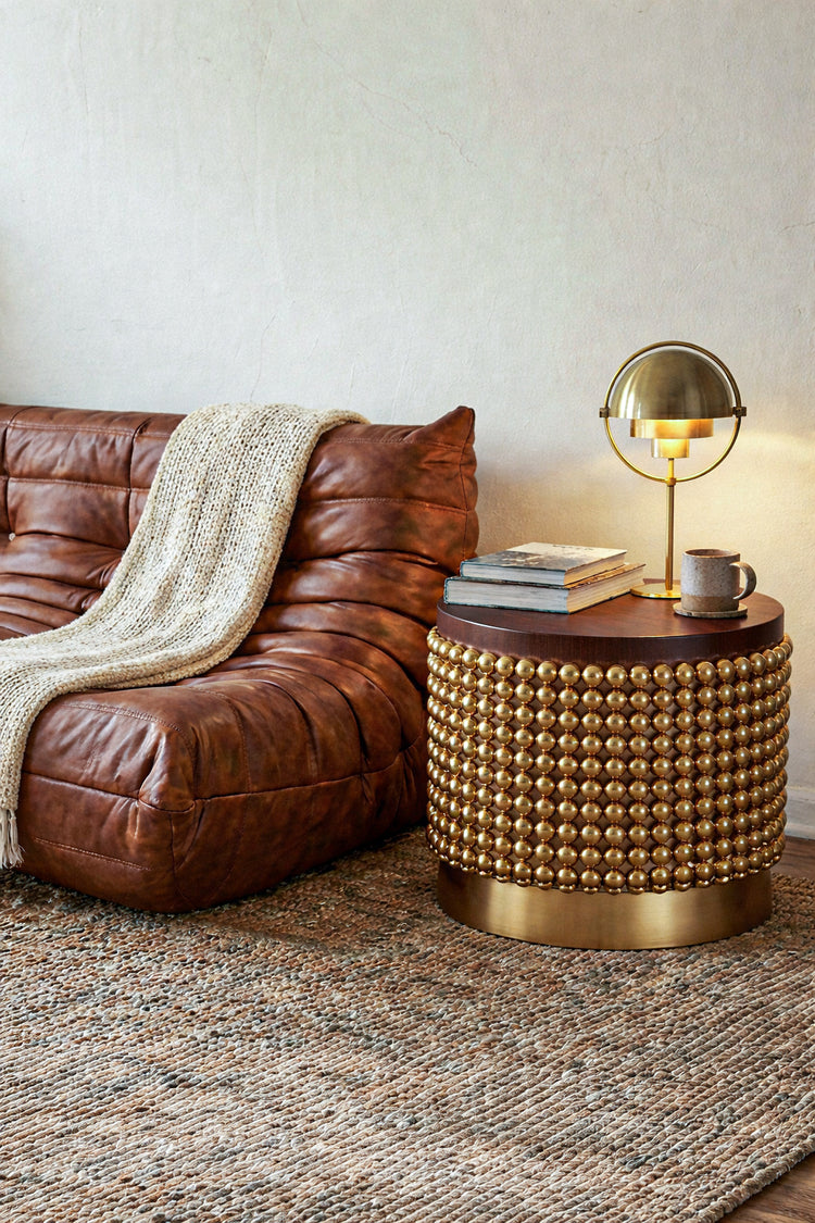 Handcrafted Lustra side table with spherical metal base by Hekla Property.
