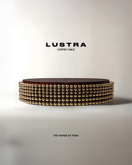 Handcrafted designer coffee table in ebony veneer and gold-plated stainless-steel spheres.