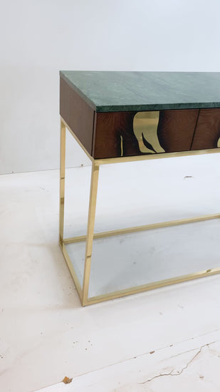 Designer console table with soft-close drawers, oak veneer finish, brass structure, and green marble detailing.