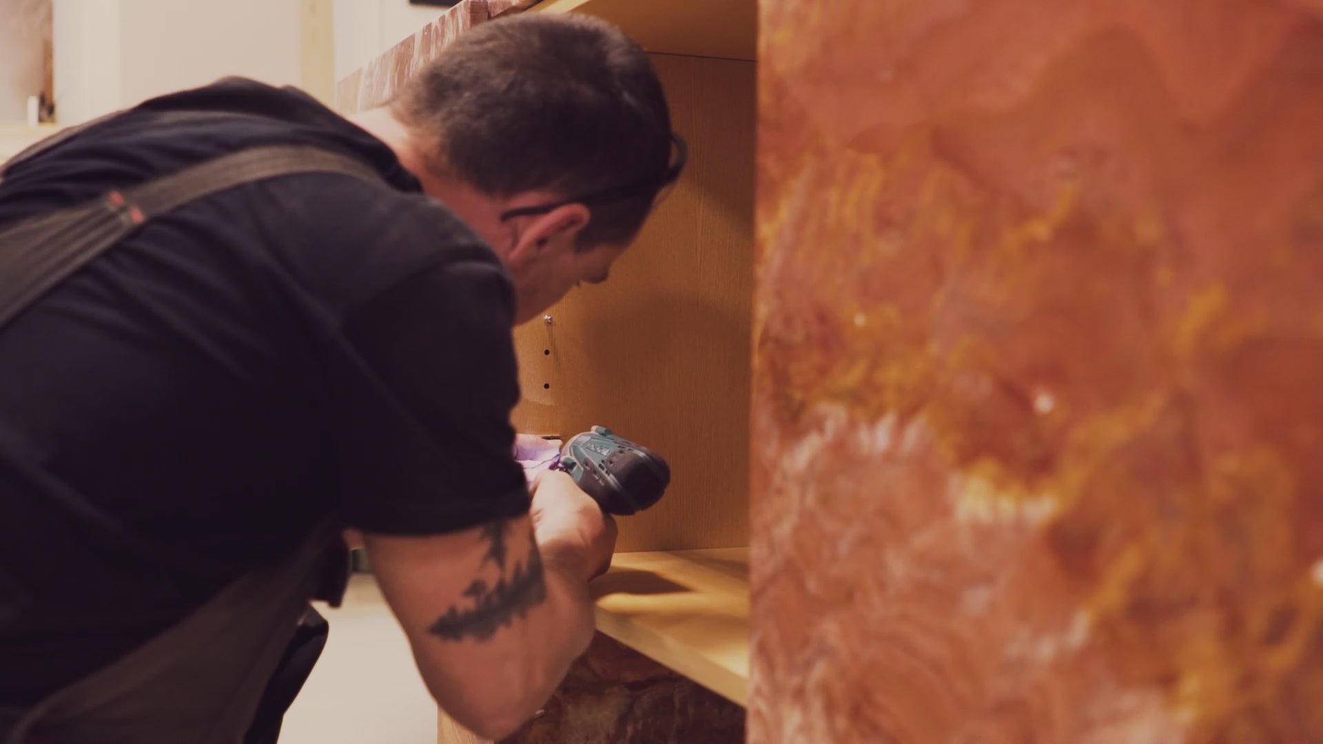 Custom red onyx cabinet with ash wood interior