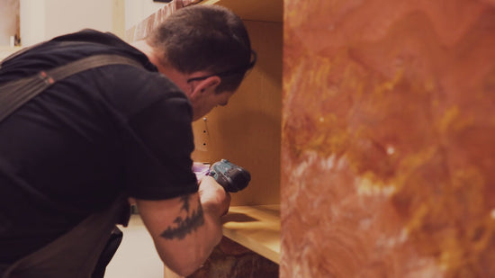 Custom red onyx cabinet with ash wood interior