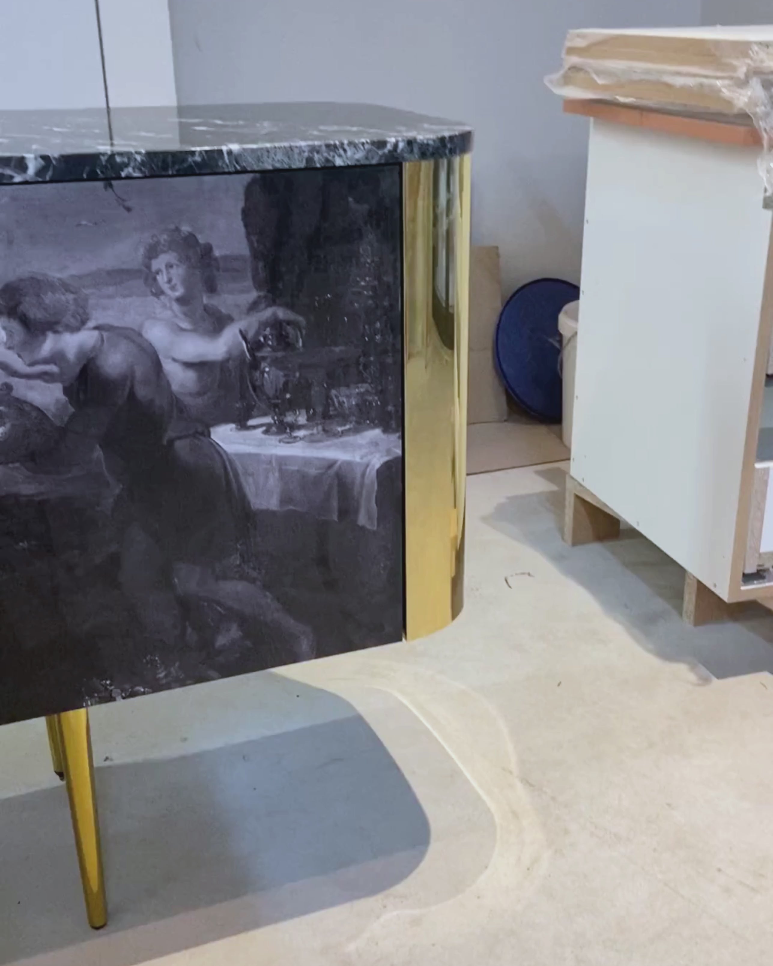Feast Sideboard with black Nero marble top and polished brass legs by Hekla Property.