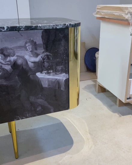 Feast Sideboard with black Nero marble top and polished brass legs by Hekla Property.