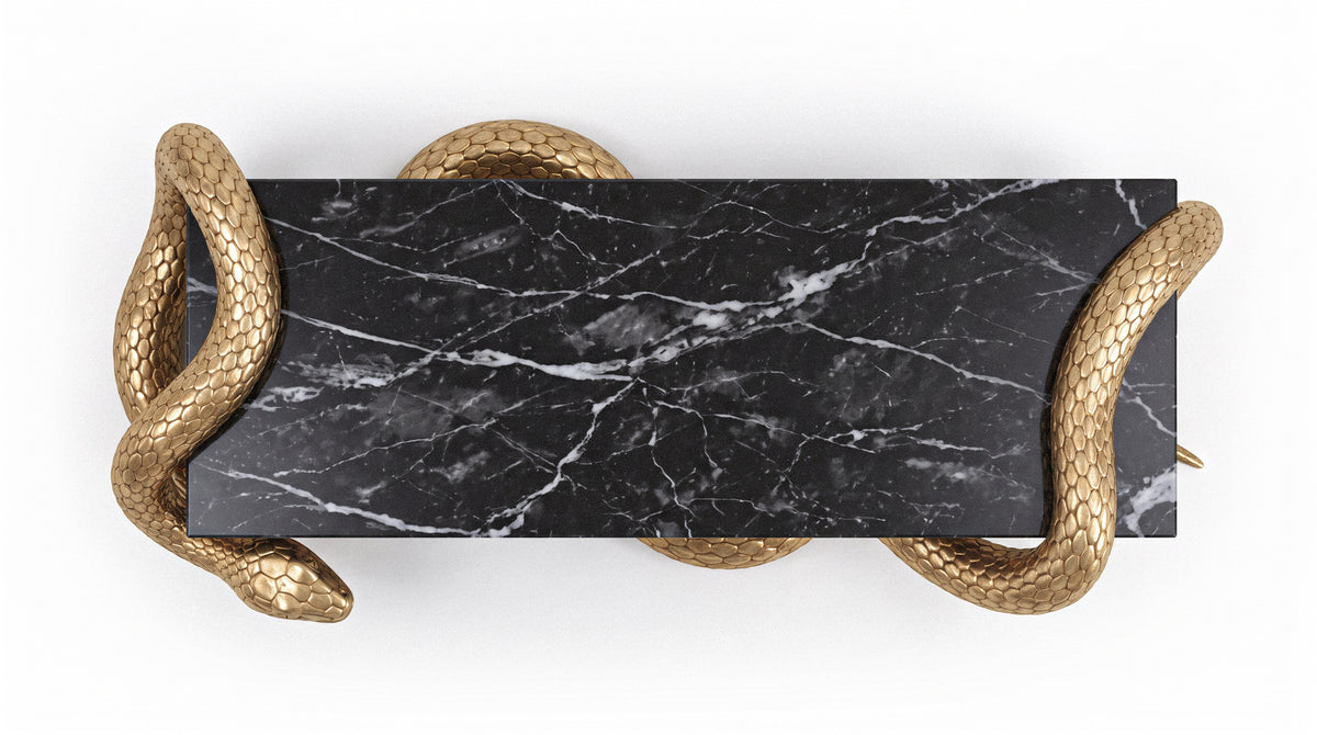 A rectangular black marble console table with a metallic gold snake sculpture wrapping around it, shown from a top-down view on a white background.